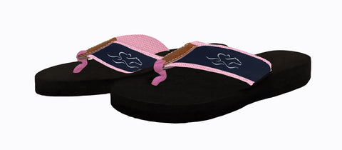 Womens black soled wedge flip flops featuring our custom navy and white ribbon on pink backing.