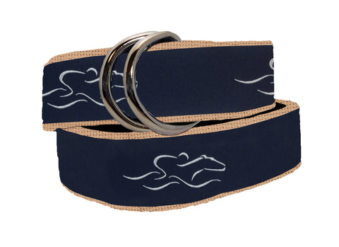 A womens signature ribbon belt featuring navy ribbon with our white icon stitched on a canvas tan backing.