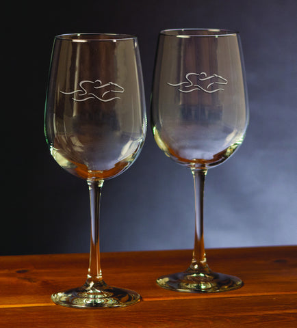 A set of 18.5 ounce all purpose stemware glasses beautifully etched with the EMBRACE THE RACE icon.