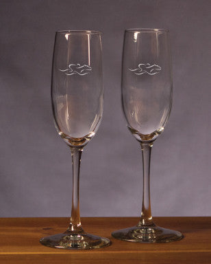 A set of 8 ounce beautifully etched champagne flutes with the EMBRACE THE RACE icon.
