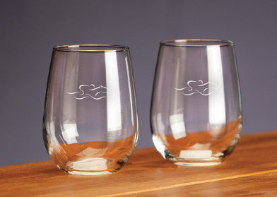 A set of 17 ounce stemless wine glasses beautifully etched with the EMBRACE THE RACE icon.